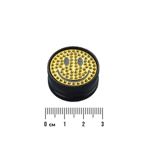 Champ High Grinder Yellow Smile Edition with black base and gold smiley design, perfect for collectors.
