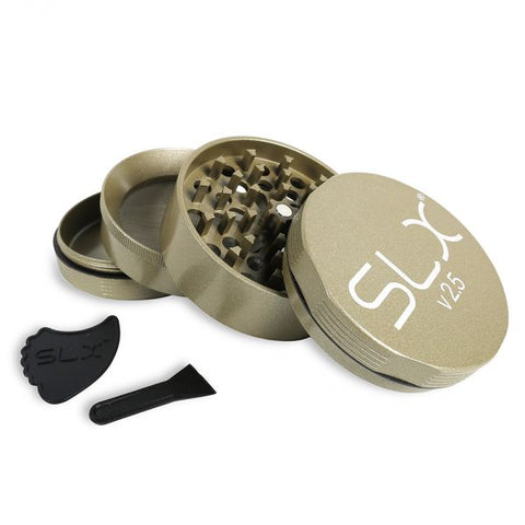 SLX Grinder No Sticky Champagne 62mm V2.5 with anti-stick coating and scraper tool in a stylish gold color