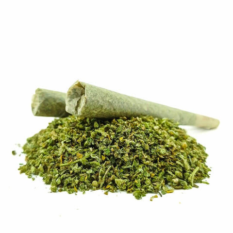 Pre Rolled Joint - V No.1 with Swiss CBD on a pile of finely ground CBD flowers.