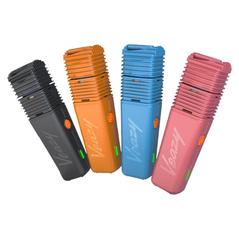Storz & Bickel Veazy Dry Herb Vaporizers in four colors: black, orange, blue, and pink.