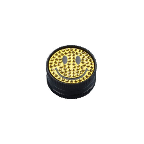 Champ High Yellow Smile Grinder with a cheerful gold smiley design, perfect for collectors and practical use.