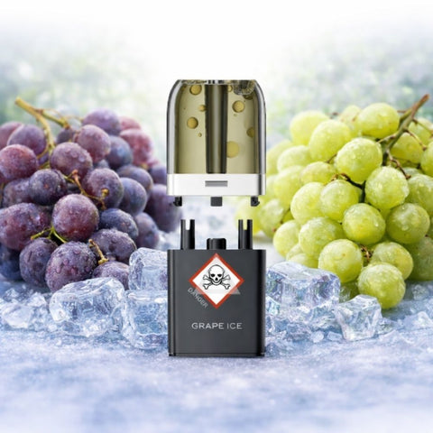 VOZOL - Neon Plug Max Pod Tank Pack & E-Liquid Container in front of grapes and ice.