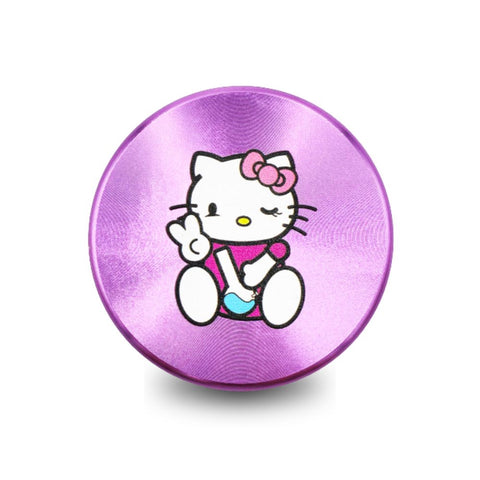 Hello Kitty Aluminium Grinder Bong Violet 50mm mit lila Design und Hello Kitty Motiv auf der Oberfläche.