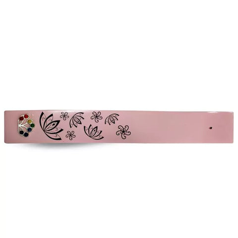 Incense holder made of pink wood with lotus emblem
